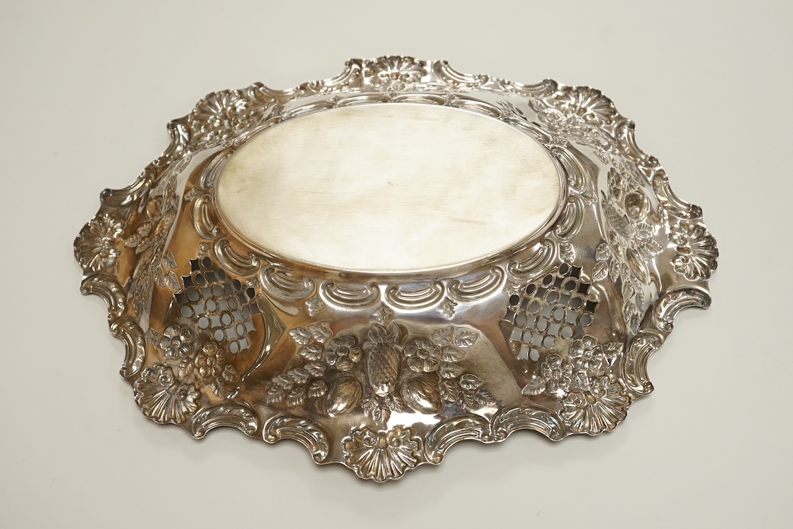 A late Victorian pierced silver oval dish, with shell and scroll border, by Ellis & Co, Birmingham, 1897, length 30.4cm, 10.5oz.